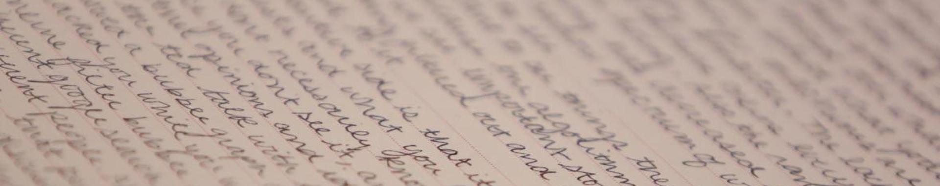 Handwriting on line paper.